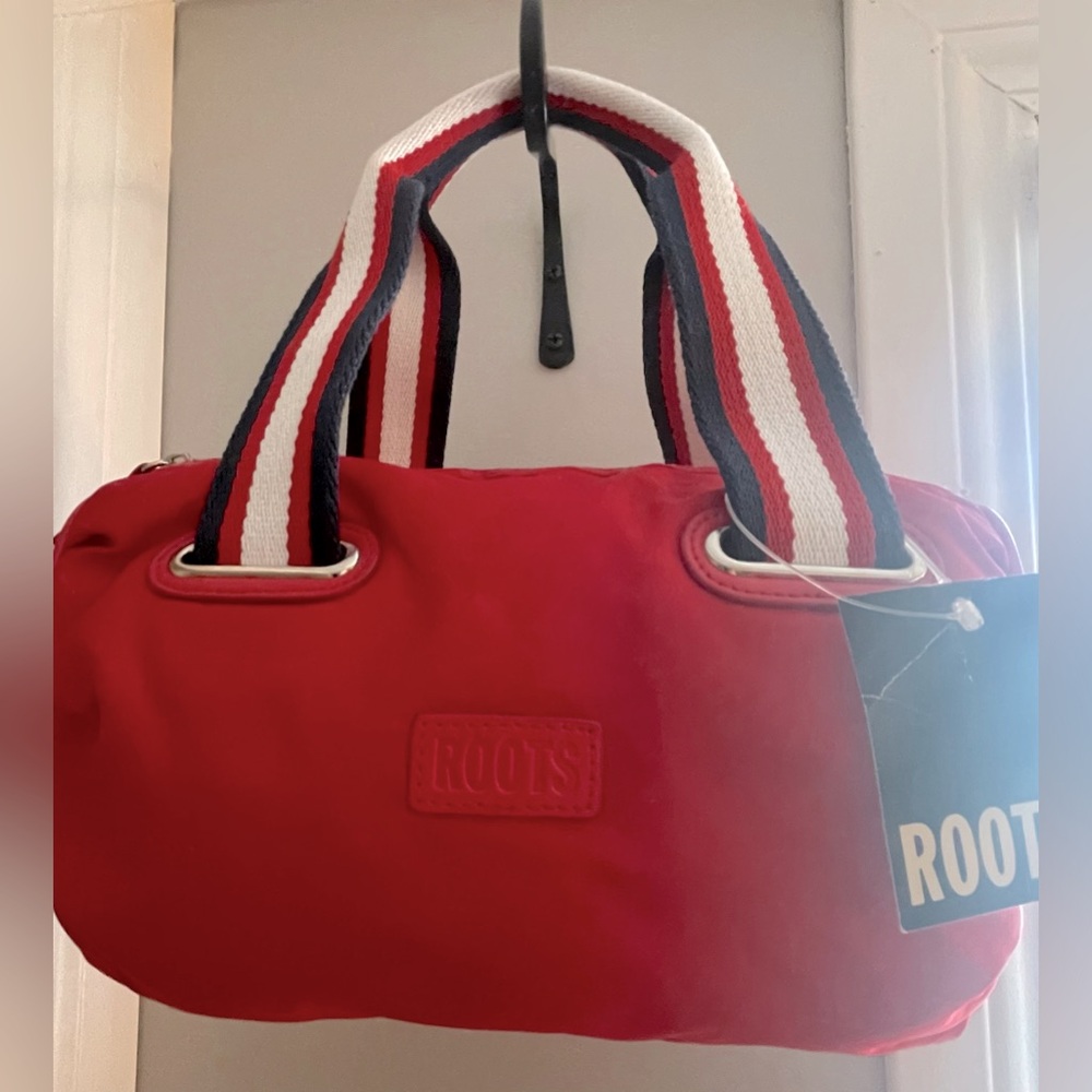 Roots mini duffel purse